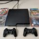 PS3 with two controllers and CD’s