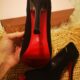 Black suede red bottom heels